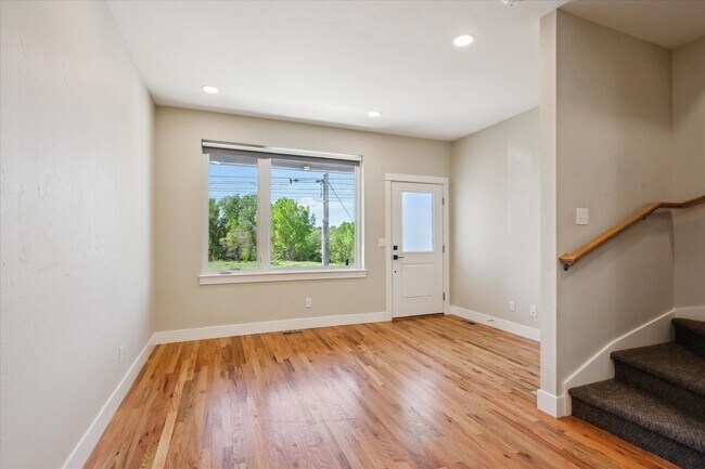 Building Photo - Modern 4-Bedroom Townhome with Rooftop Deck Near Sloan’s Lake & Light Rail
