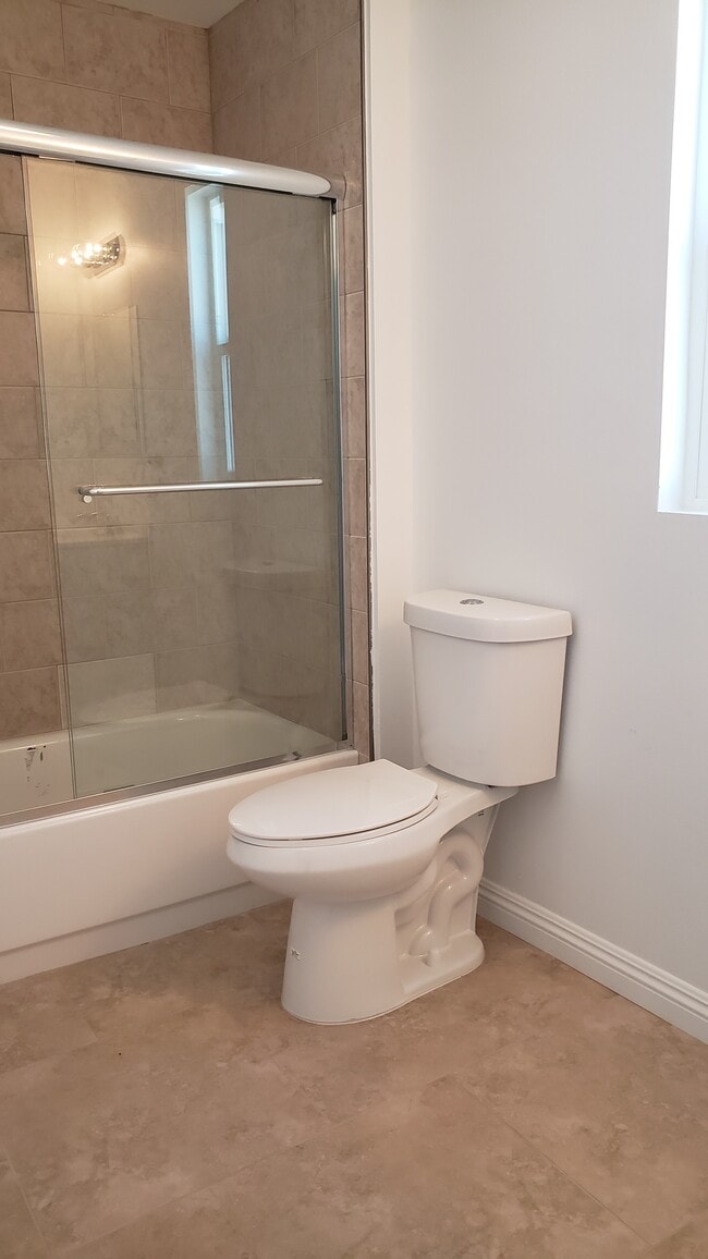 Building Photo - 2057 W Florence Ave