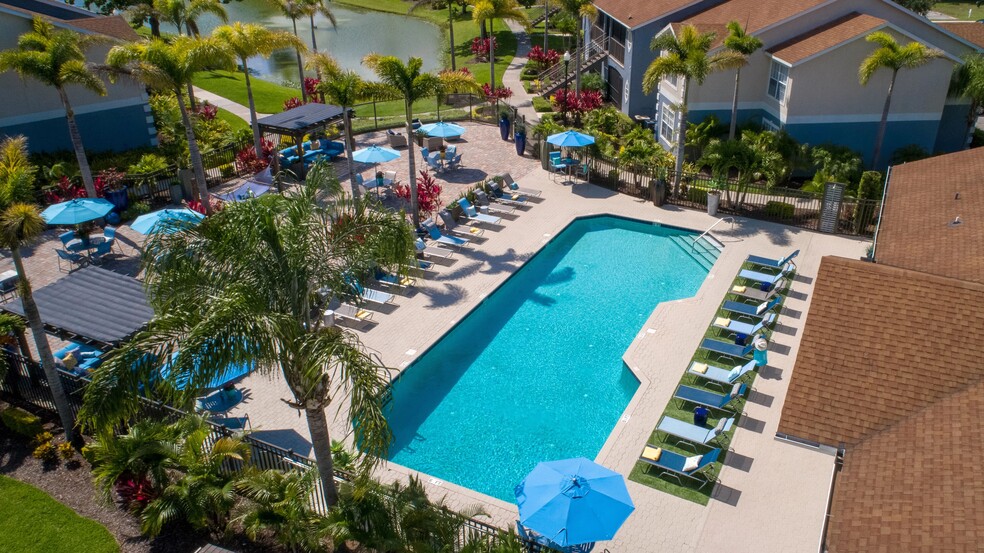 Bask in tranquility at our vibrant poolside oasis. From inviting cabanas to grill-ready spaces, immerse yourself in relaxation amidst the shimmering pool and expansive sundeck—an idyllic retreat for ultimate relaxation. - Soleil Blu Luxury Apartments