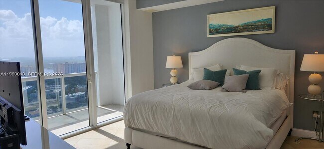 Building Photo - 18201 Collins Ave