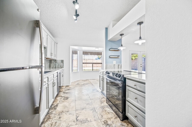 Building Photo - 3060 E John Cabot Dr