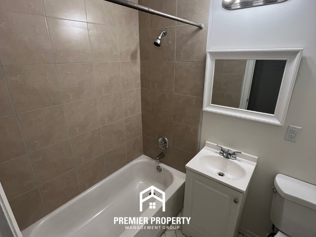 Building Photo - Spacious 3BR/2BA Home with Den & Living Room | Brick Fireplace & Large Yard