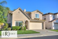 Building Photo - A Captivating and Charming 2 Story Home Ne...