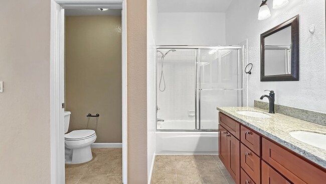 Building Photo - Lovely Upgraded 2-story Townhouse w/ Attached Garage, Guest Bathroom and Fireplace!