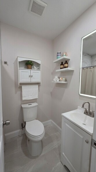 Building Photo - 8414 N River Dune St
