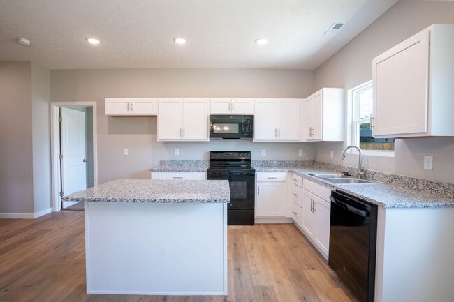 Building Photo - BRAND NEW 3 BEDROOM HOME WITH 3 CAR GARAGE