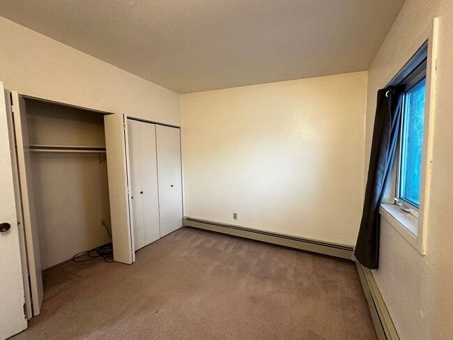 Building Photo - Pet-Friendly 2 Bed, 1.5 Bath Condo with At...