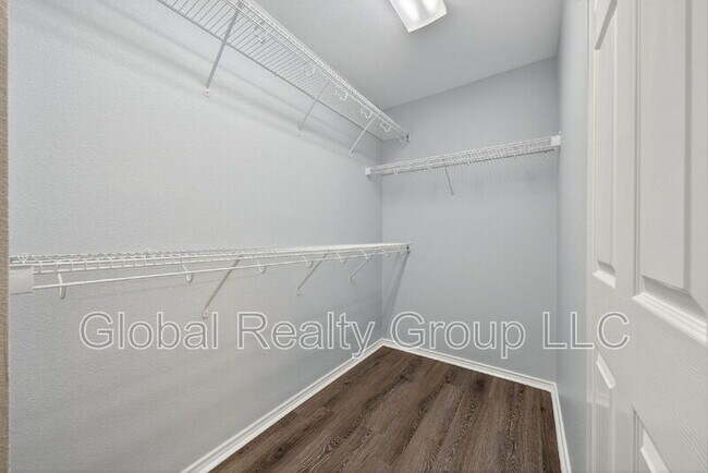 Building Photo - 10411 Artesia Wells