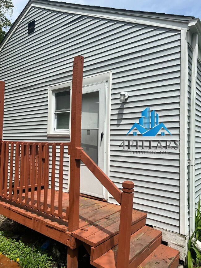 Building Photo - Charming 2 Bedroom Duplex in La Porte with Spacious Layout and Prime Location