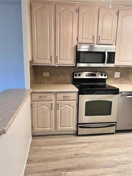 Building Photo - 9655 E Center Ave