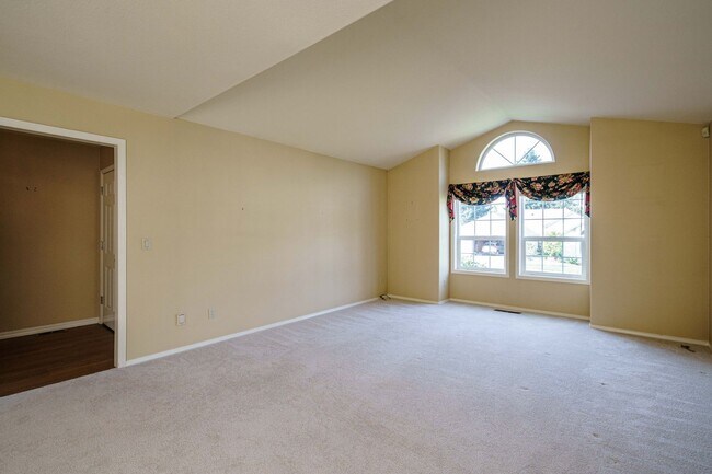 Building Photo - Beautifully Landscaped 1/4 acre with Well Maintained 4 bedroom 2 Bath Home with 3 Car Garage