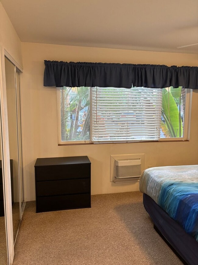 Building Photo - Move-In Ready 2BR/2BA Condo – Fully Furnished, AC, Washer/Dryer, Parking