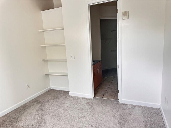 Building Photo - 711 Cosmopolitan Dr NE