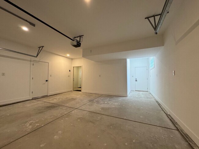Building Photo - Vaulted Ceilings & Hardwood Floors in This Charming Indianapolis L