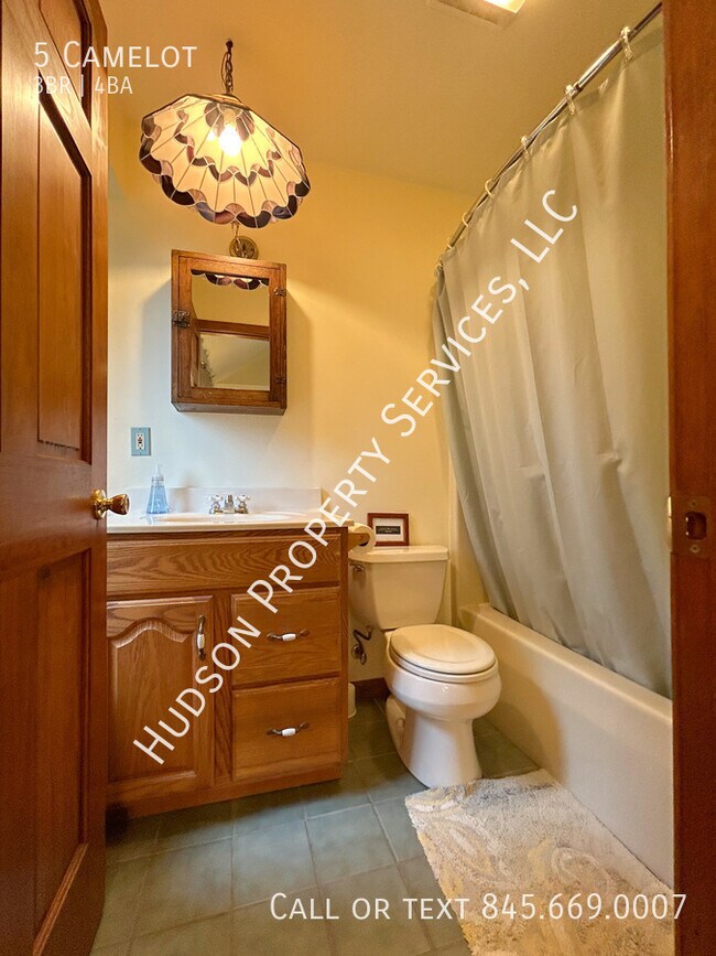 Building Photo - 5 Camelot-