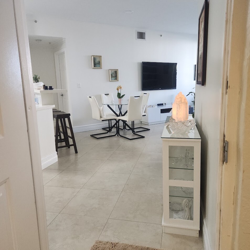 FROM FRONT DOOR TO LIVING ROOM - 357 Almeria Ave