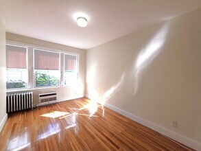 Building Photo - No Brokers Fee, No Security Deposit,  Heat, Hot Water Included, Elevator, Laundry, Parking for Rent