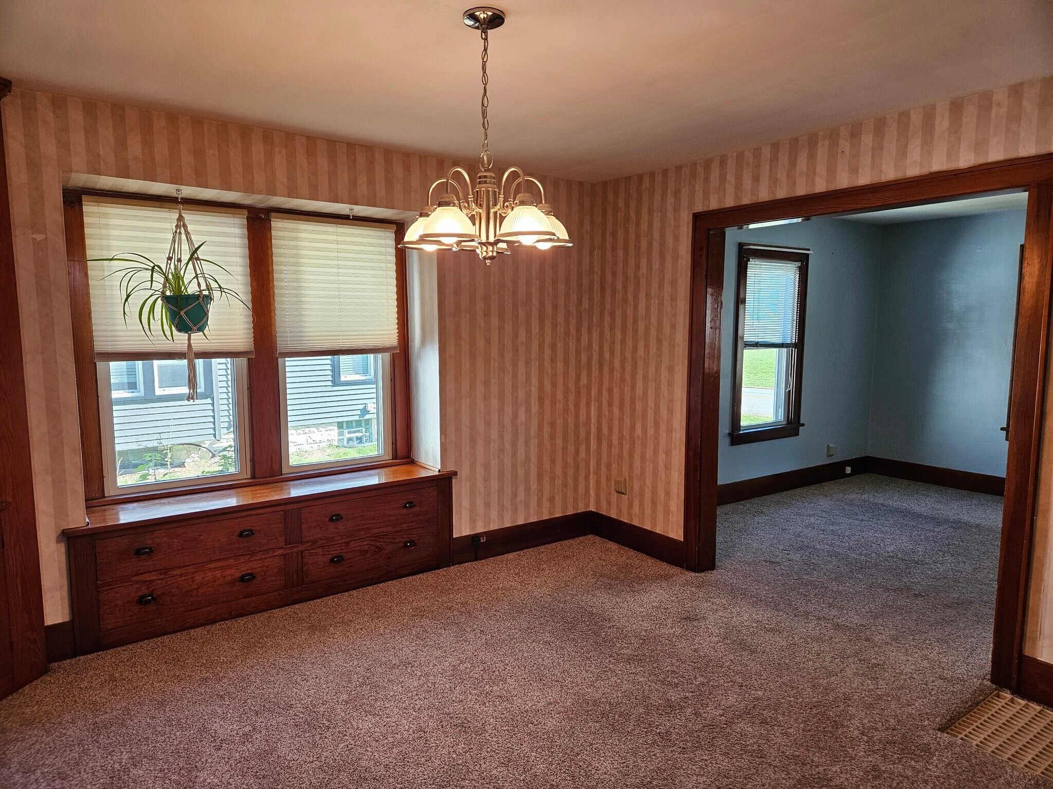 Dining room with built in cabinets and drawers - 4047 Mogadore Rd