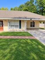 Exterior photo digitally enhanced for lighting and clarity. Property features were not altered - 1875 N Alameda Dr