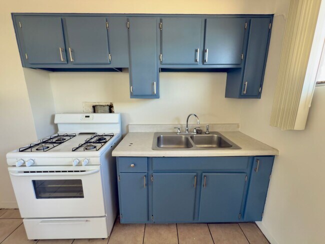 Building Photo - Two Bedroom w/ A/C, Yard and Carport