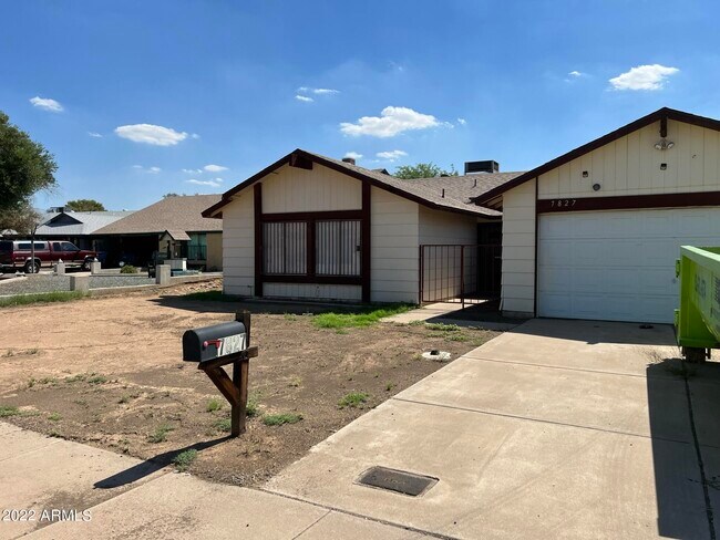 Building Photo - 7827 W College Dr