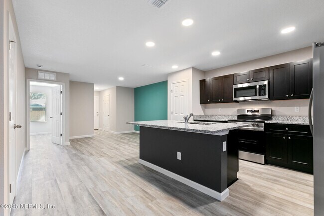 Building Photo - 8822 Eaton Ave