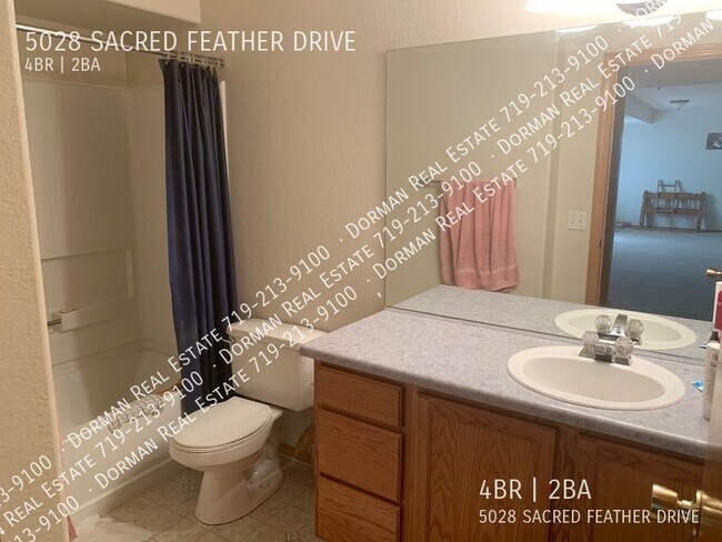 Building Photo - 5028 Sacred Feather Dr