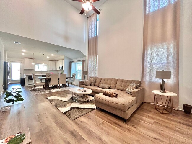 Building Photo - Inviting 4-Bed, 2.5-Bath Home with High Ceilings and Covered Deck