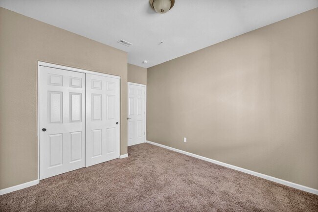 Building Photo - Sun-Filled, Spacious Living with a Three-Car Garage