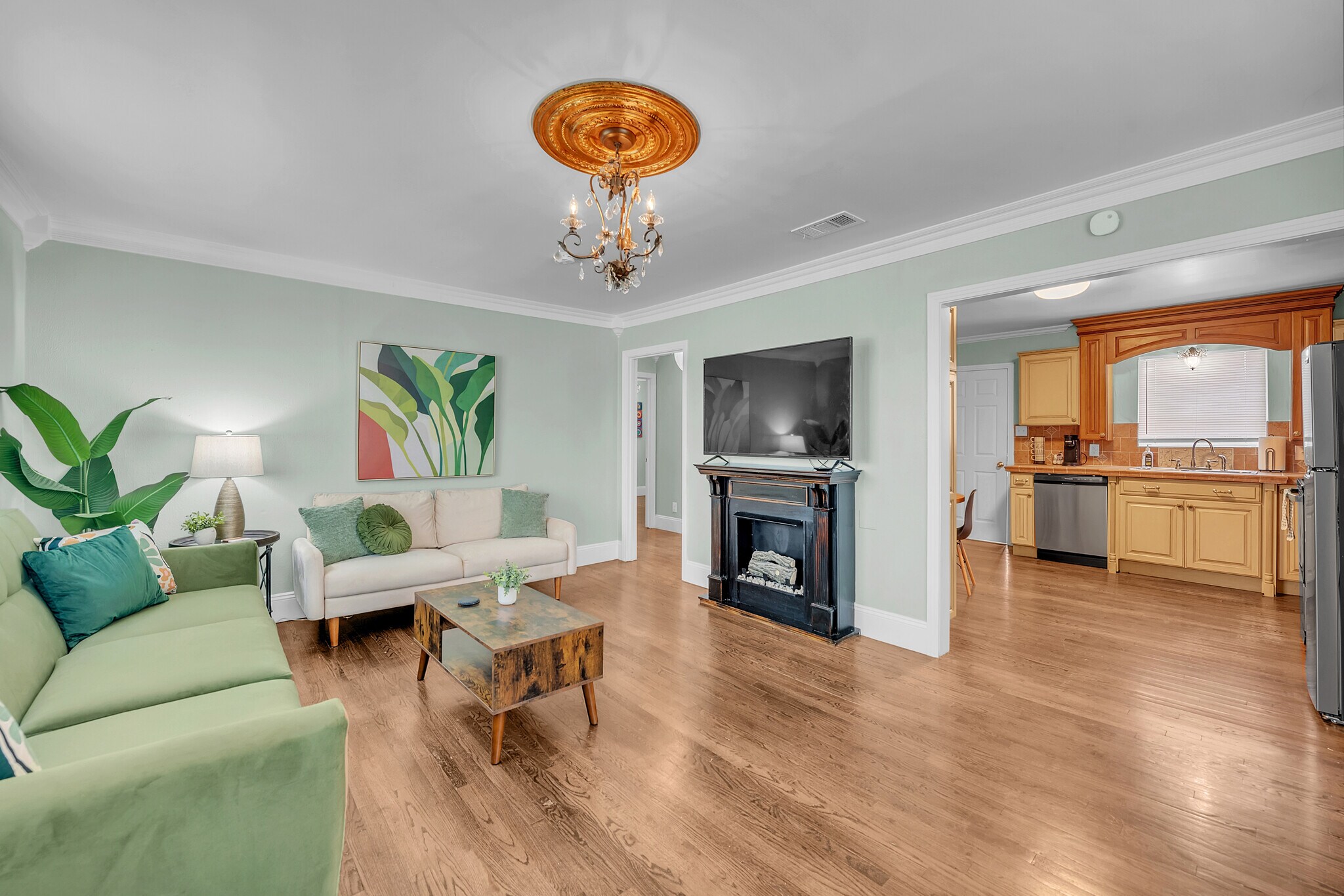 Large furnished living room with Smart TV, fast WiFi, and Samsung-ready setup. - 2301 North Dr