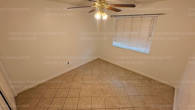 Building Photo - 3 bedroom 2 bathroom home on a corner lot with extra fenced parking.