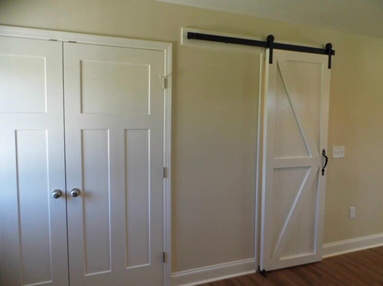 Sliding barn door opens to a large pantry, double door offers a convenient place for the NEW washer/dryer which comes with the unit - 2312-A Belle Ave NE