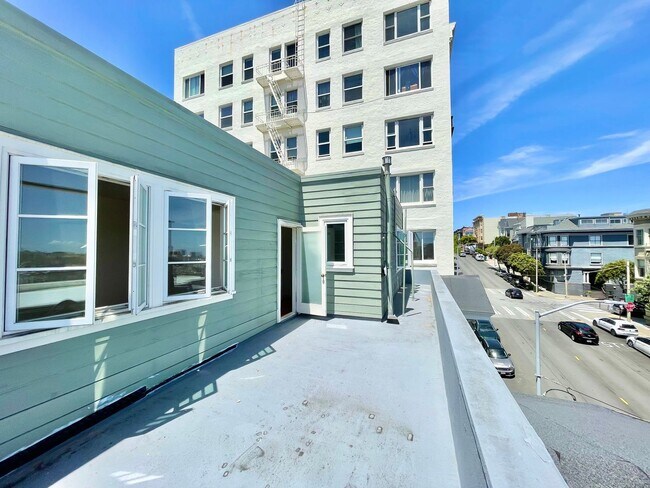 Building Photo - Bright and Airy 2 Bedroom Penthouse in the...