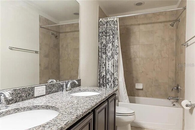 Building Photo - 9215 Mountain Magnolia Dr
