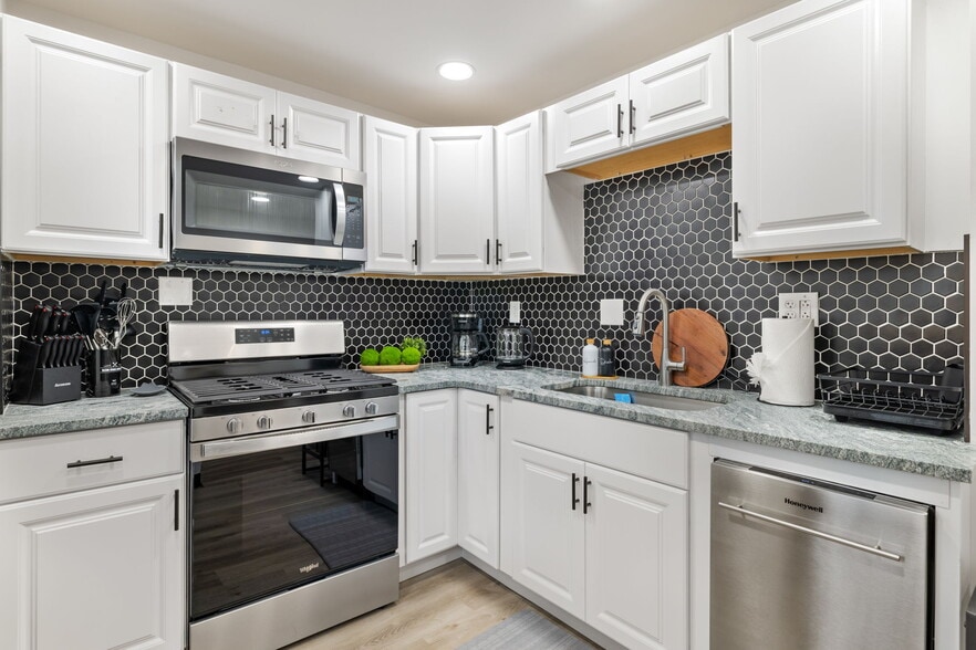 Kitchen with Stove and Microwave - 10 Carrie St