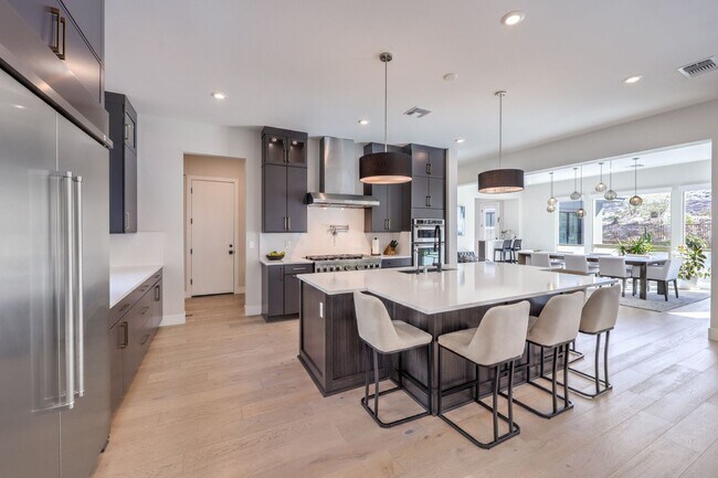 Building Photo - Exquisite 6-bed/ 6-bath residence nestled within the prestigious, guard-gated community of Revere...