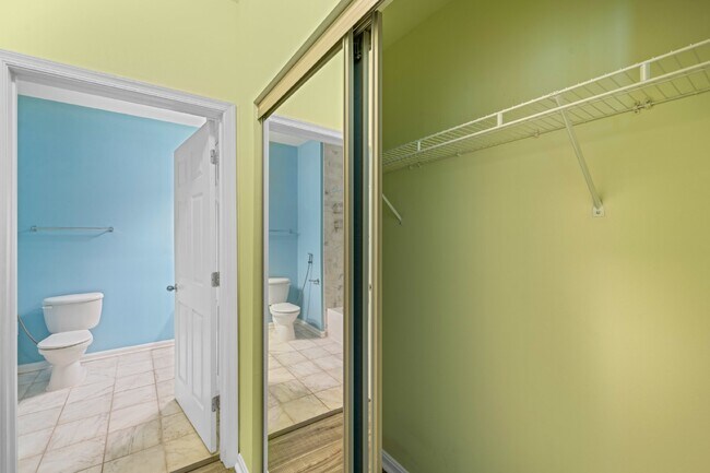 Building Photo - Two-bedroom, two-bathroom model with a den, located on the third floor.