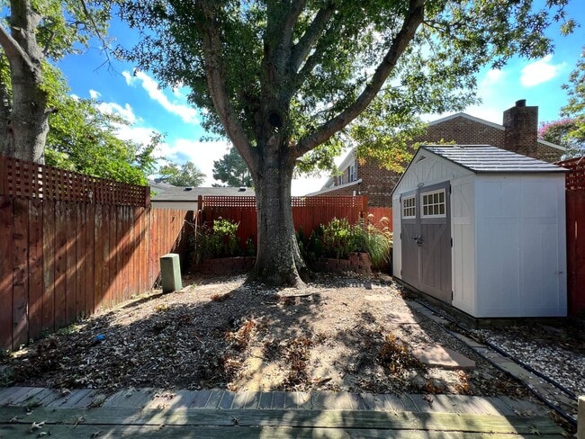 Building Photo - Three-bedroom, two-and-a-half bathrooms in...