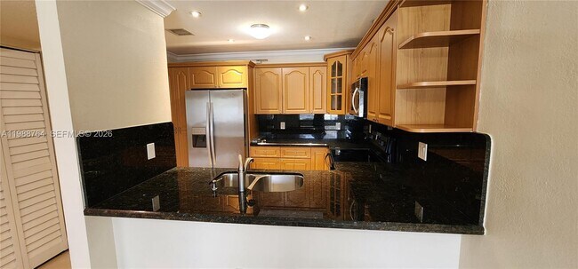 Building Photo - 18810 NW 57th Ave