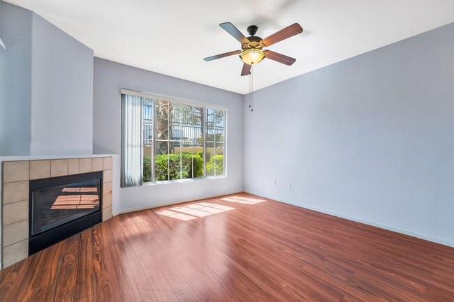 Building Photo - Modern Ground-Level Condo With A One Car Garage in Prime Southwest Location with Resort-Style Ame...