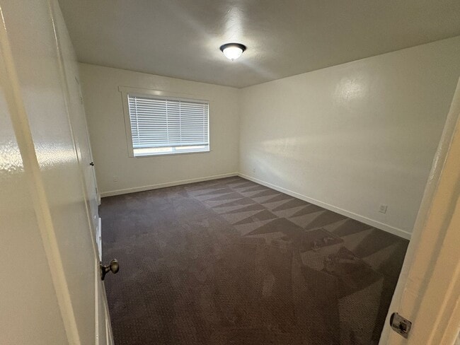 Building Photo - $1000 off first months rent!!  Spacious 4 bedroom 2 bath house with large backyard!