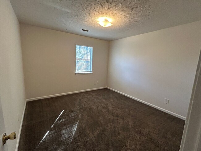 Building Photo - 6853-6853 Selman Dr