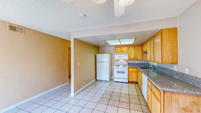 Building Photo - "Discover Modern Comfort: Spacious 2-Bed, ...