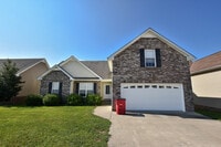 Building Photo - Pet Friendly Three Bedroom with Bonus!
