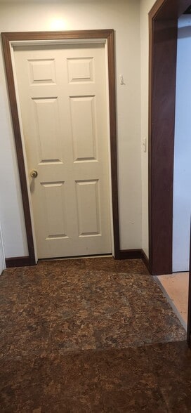 Downstairs doorway to bedroom and entry to kitchen - 2116 Thaler Ave