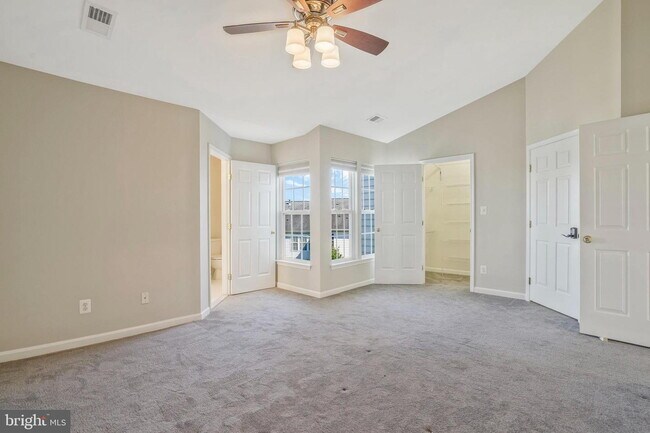 Building Photo - This beautifully maintained brick-front, three-level townhome is located in a highly sought-after...