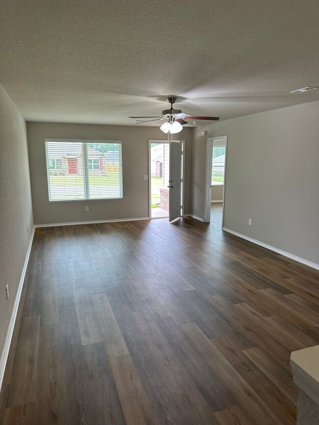 Building Photo - Pre-Leasing Now! Discover Spacious Living in This 4-Bedroom, 2-Bath Cabot Home