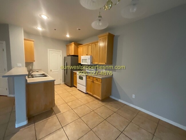 Building Photo - 3 Bedroom, 3 Bath, 2 Car Garage with Fenced Backyard Townhouse