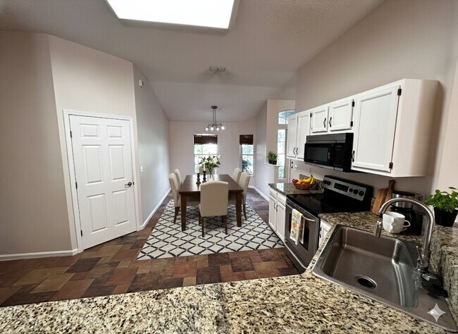 Building Photo - 4 Bed 3 Bath Home. Over 2,400 sqft Near Jacksonville Beach. Amenities, Bonus Room, Guarded Gate. ...