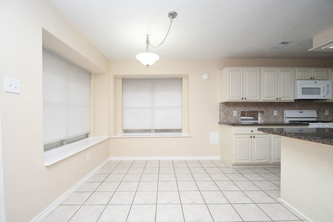 Building Photo - 10430 Sanibel Falls Ct